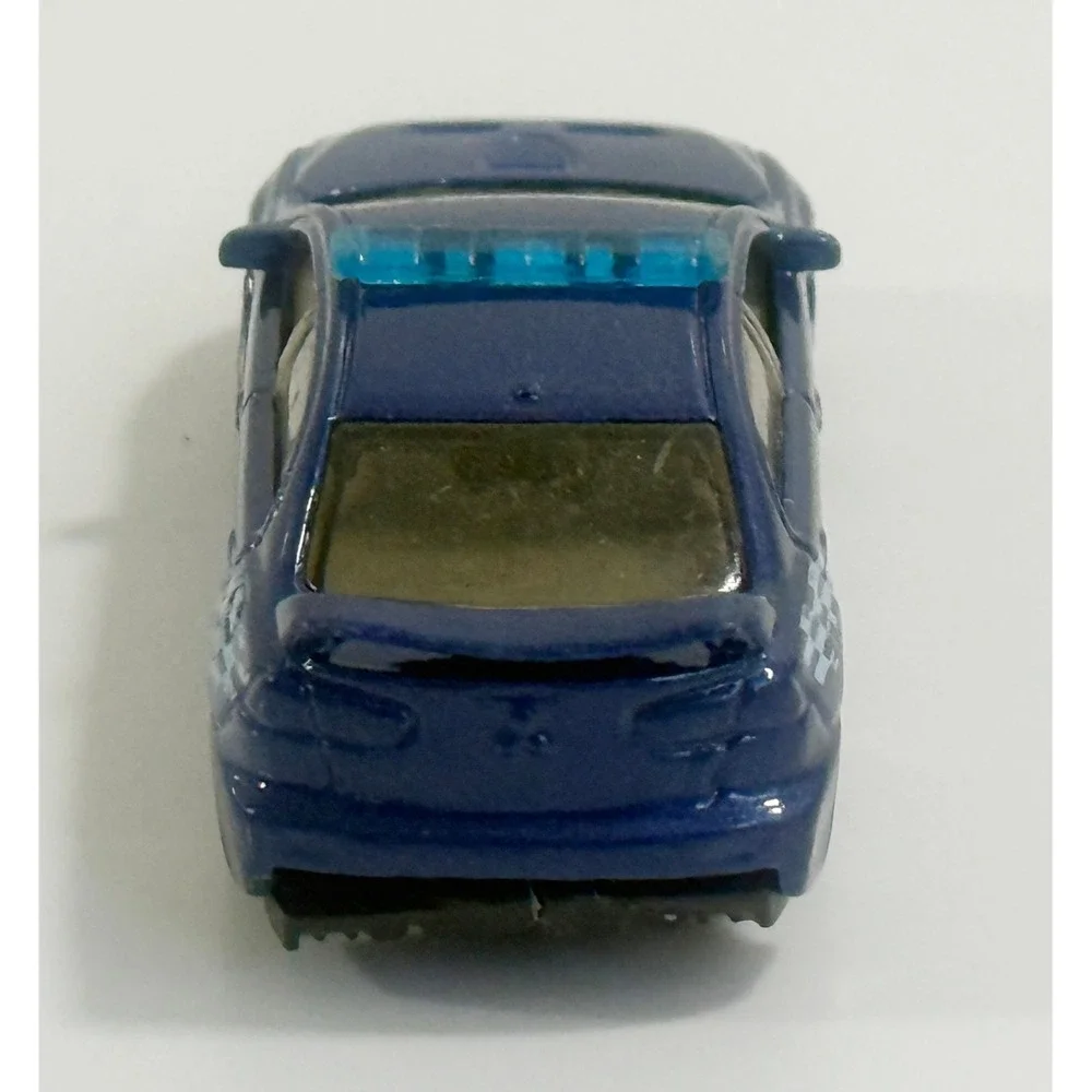 MATCHBOX 2010 BLUE MITSUBISHI EVOLUTION X POLICE 1:62 DIE-CAST TOY CAR MATTEL‎